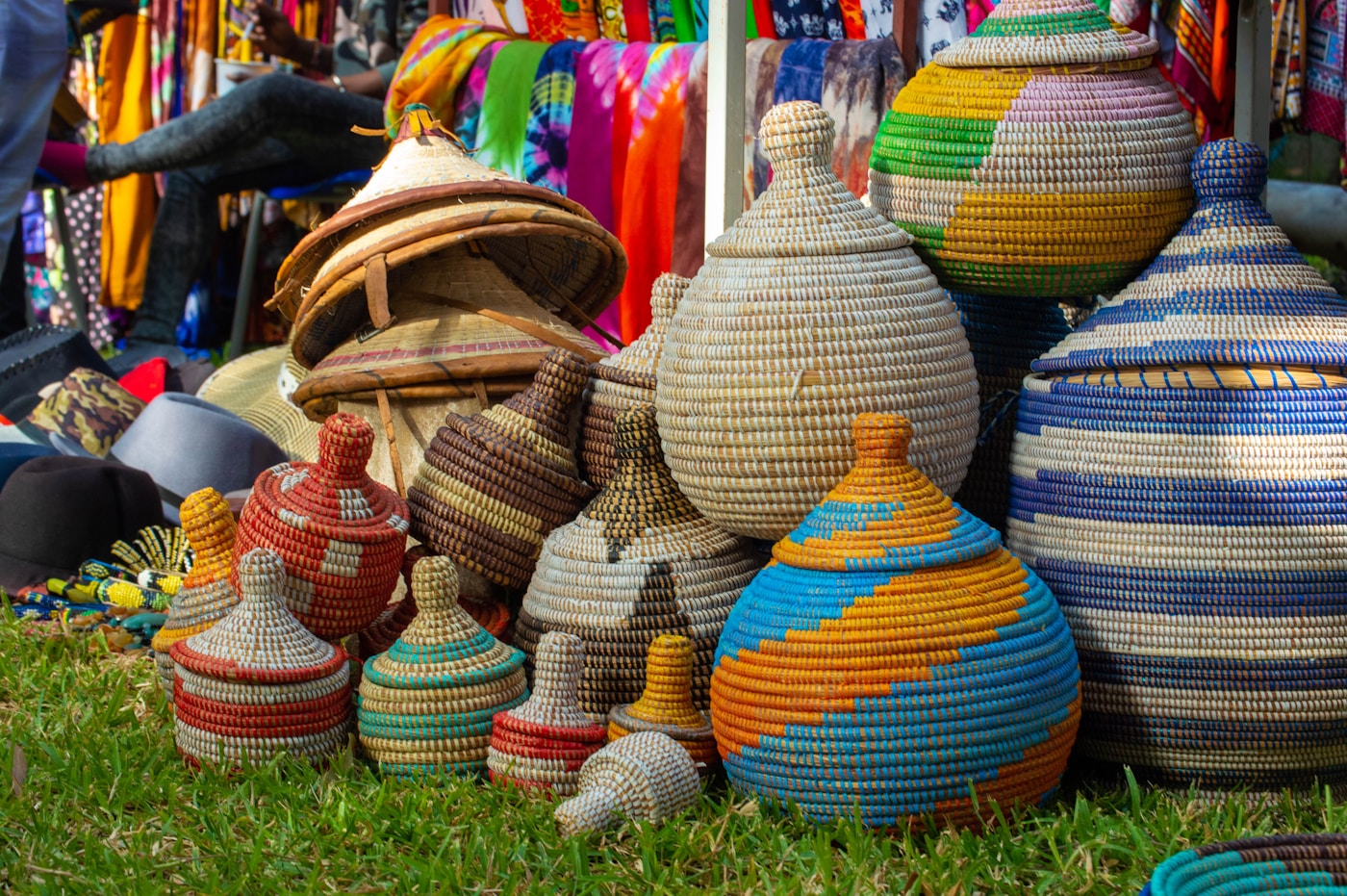 Colorful woven lidded storage baskets arranged together
